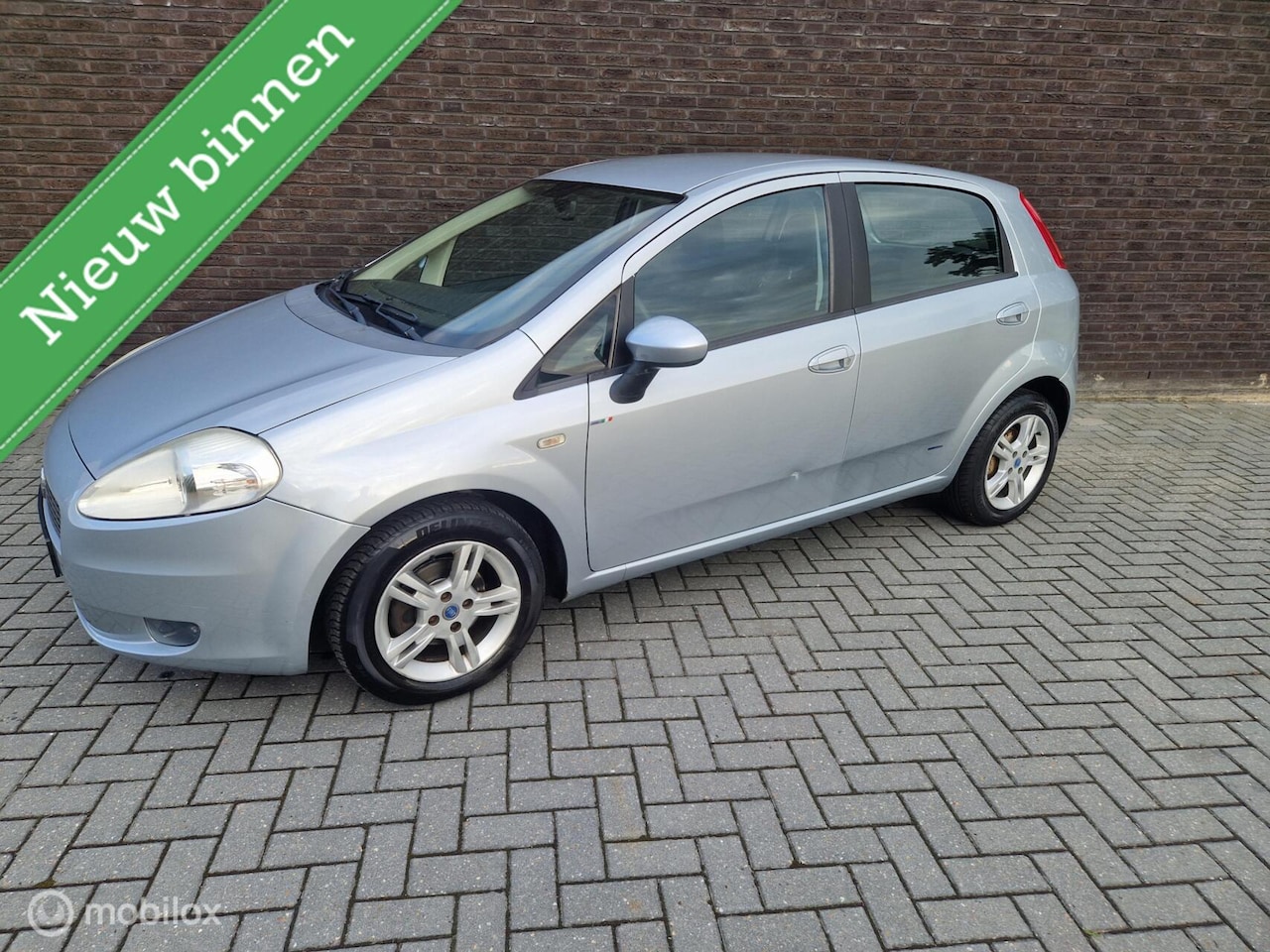 Fiat Grande Punto - 1.4 Edizione Lusso|Cruise|Airco|Trekhaak| - AutoWereld.nl