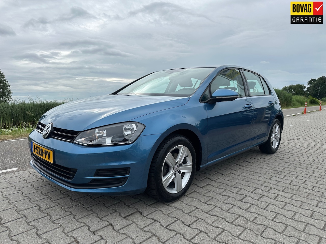 Volkswagen Golf - 1.2 TSI Navi, PDC, Bluetooth, Trekhaak - AutoWereld.nl