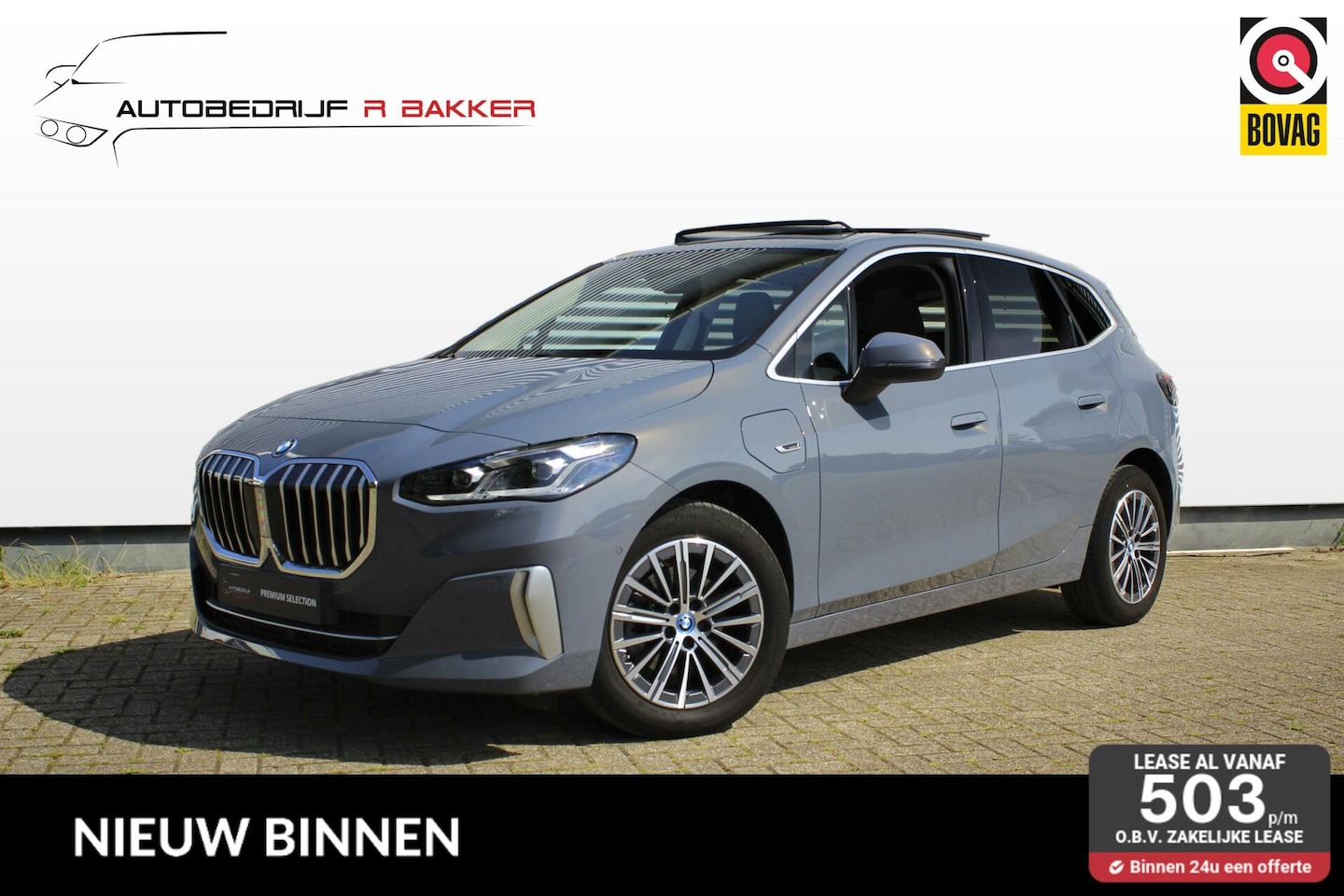 BMW 2-serie Active Tourer - 225e xDrive Luxury Line // Copper Grey Metallic - Elek. Panoramadak - Harman Kardon - Hout - AutoWereld.nl