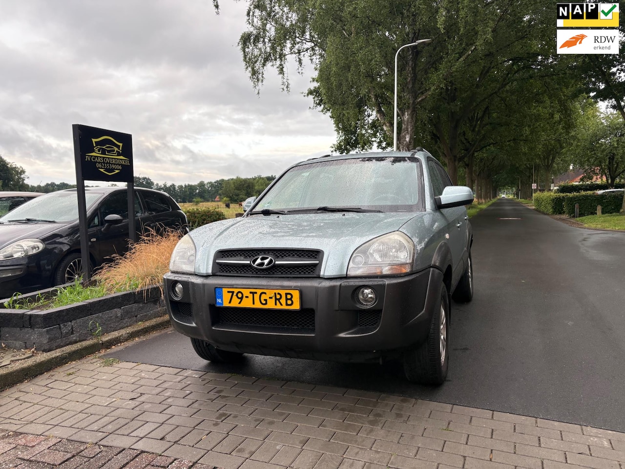 Hyundai Tucson - 2.0i Style AIRCO,CRUISE,,ELEKT PAKKET,MIDDEN ARMSTEUN,BOORDCOMPUTER,MET APK - AutoWereld.nl