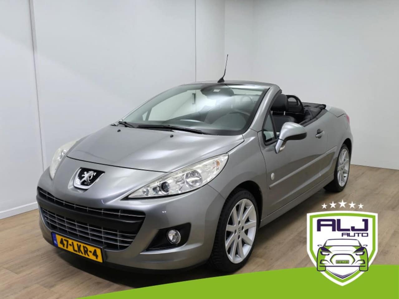 Peugeot 207 CC - Occasion 1.6 VTi Roland Garros cabriolet | Unieke uitvoering en netjes | Tweedehands Peuge - AutoWereld.nl