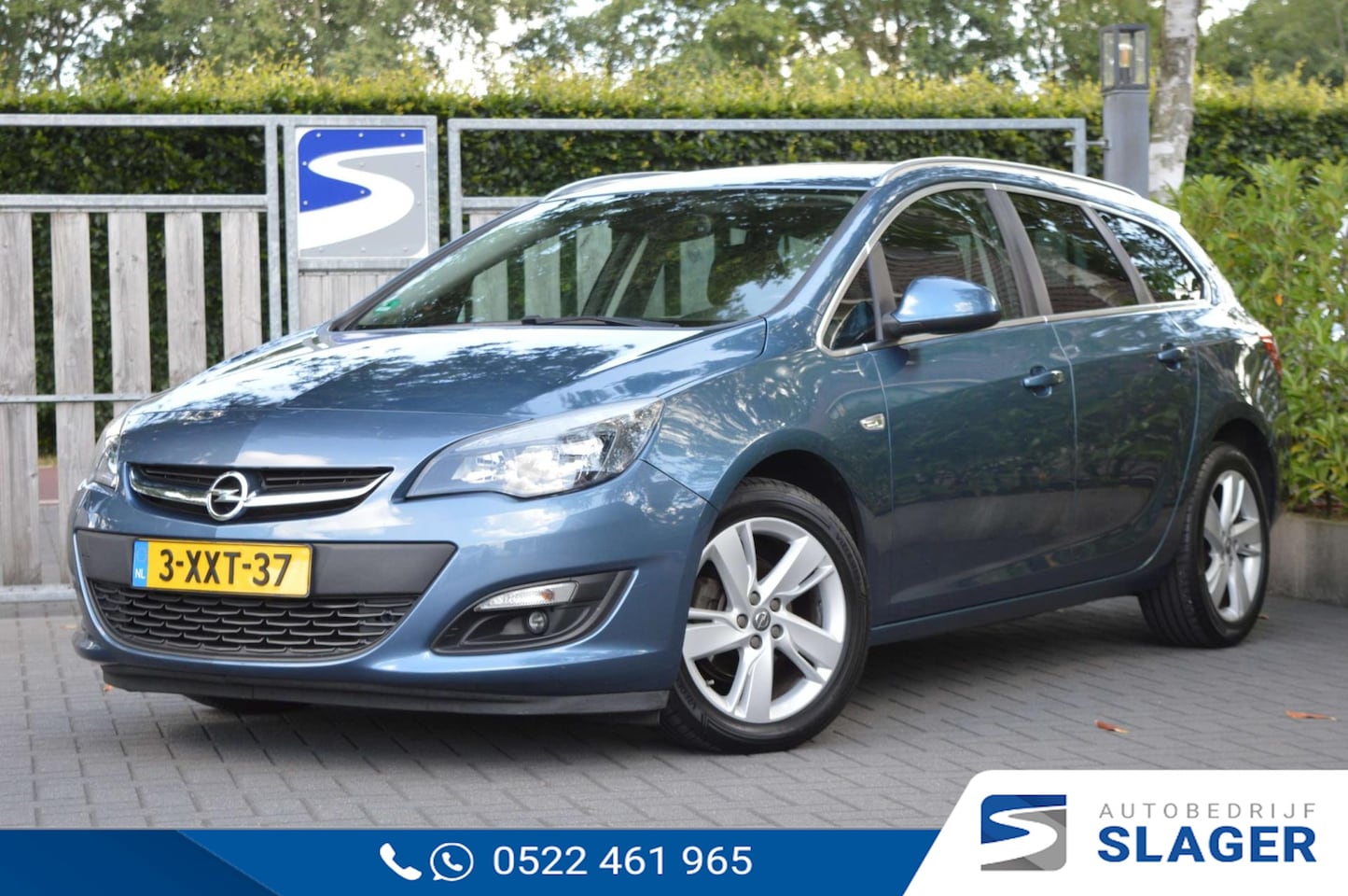 Opel Astra Sports Tourer - 1.4 Turbo Business + Cruise|Trekhaak|PDC|Navi - AutoWereld.nl