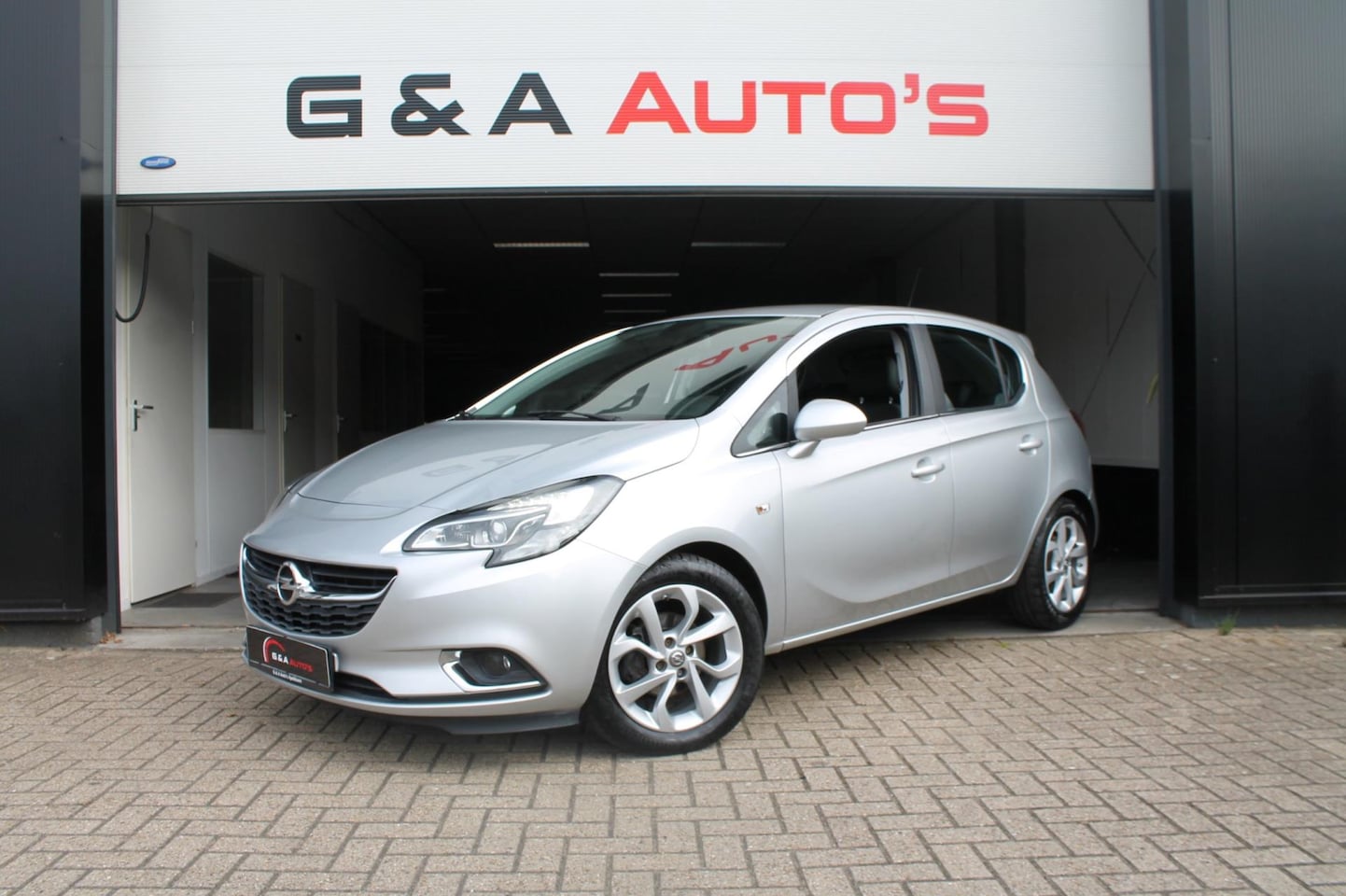 Opel Corsa - 1.4 / STOEL+STUUR VERW / CRUISE CTRL / PDC / AC - AutoWereld.nl