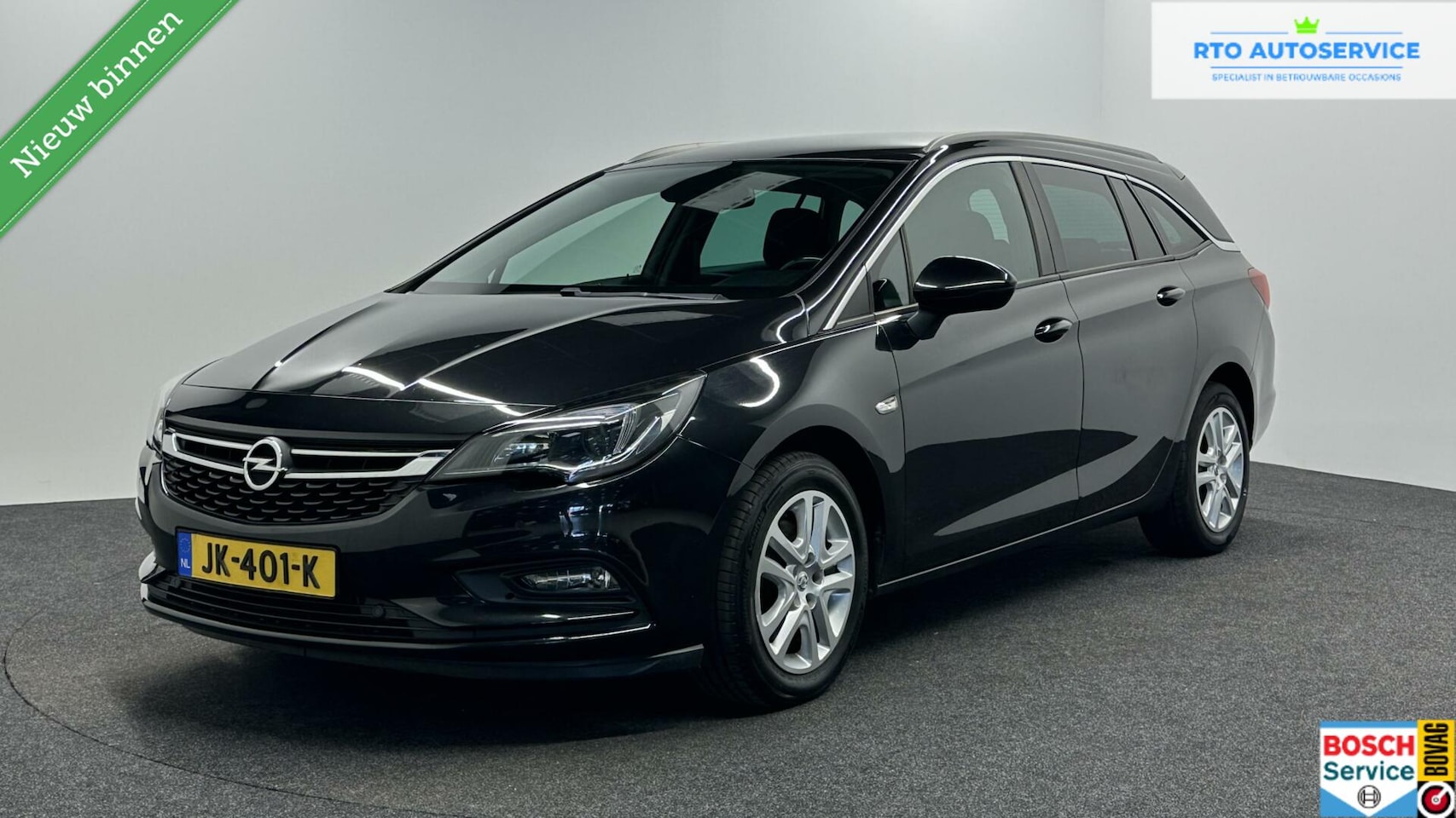 Opel Astra Sports Tourer - 1.6 CDTI Business+ NAVIGATIE CRUISE. - AutoWereld.nl