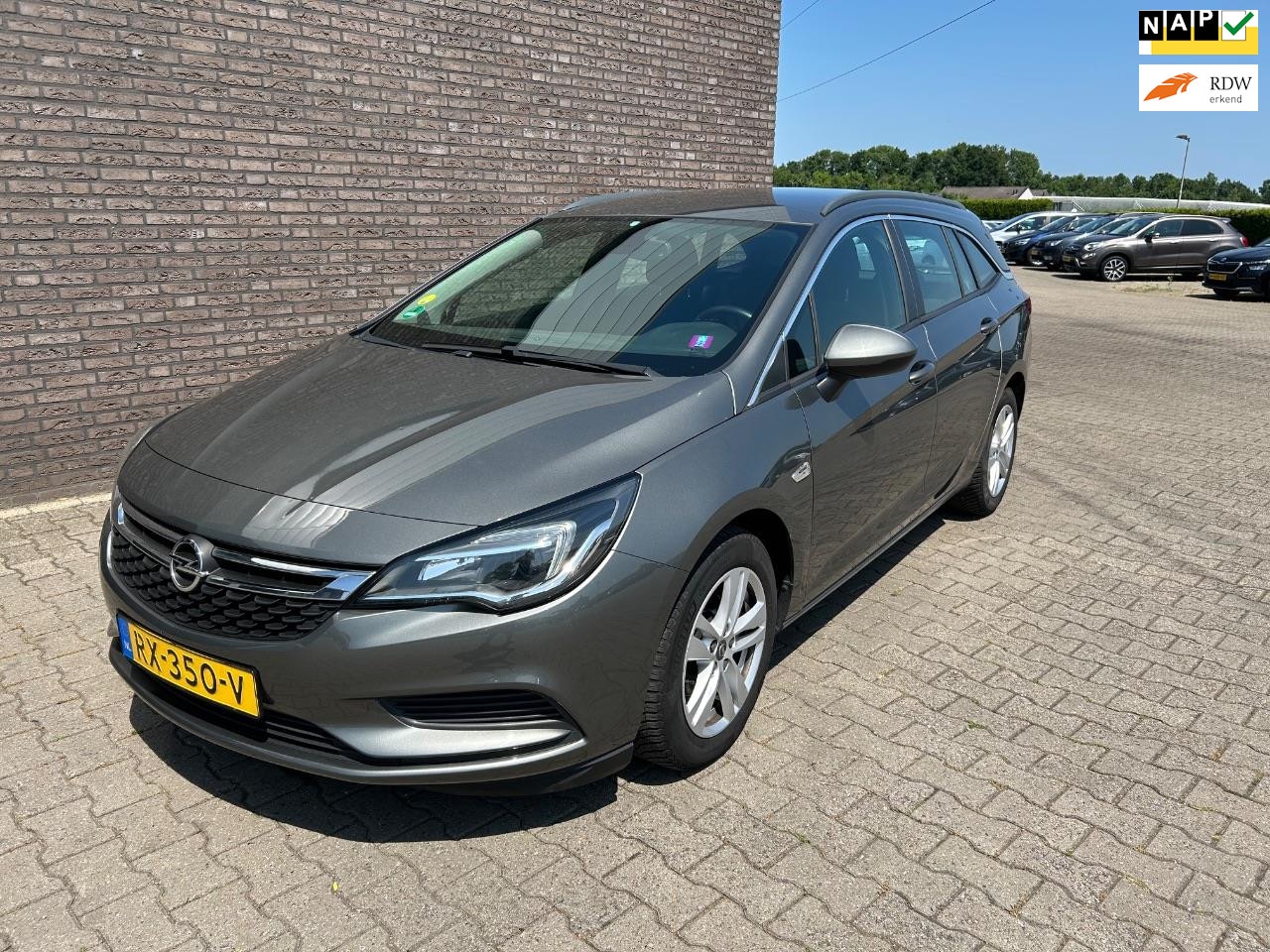 Opel Astra Sports Tourer - 1.6 CDTI Business+ EXPORT - AutoWereld.nl