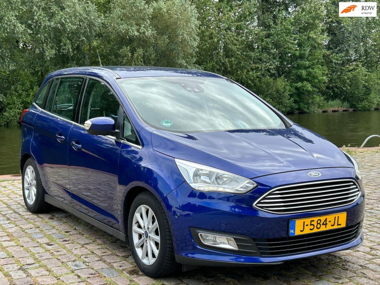 Ford Grand C-Max - 1.0 Trend 7personen airco cruis control navigatie parkeer sensor - AutoWereld.nl