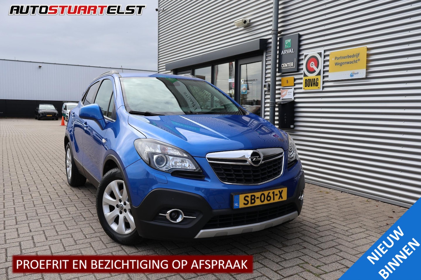 Opel Mokka - 1.4 T Cosmo WinterPack | Navi | Trekhaak | PDC | Airco | Cruise | Climate | NL-Auto | Voll - AutoWereld.nl