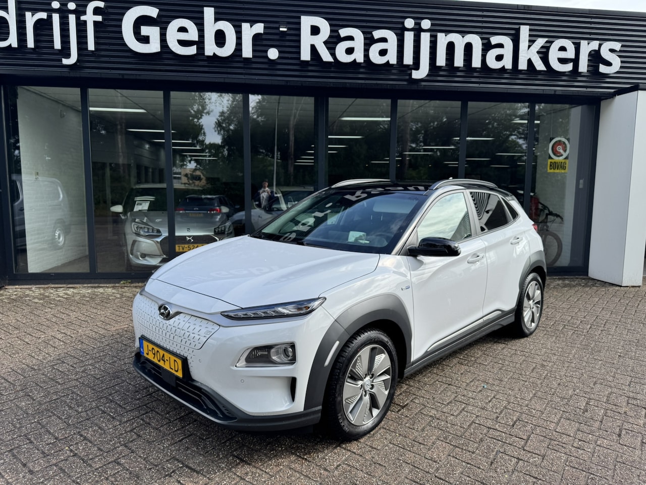 Hyundai Kona Electric - EV Premium 64 kWh*ACC*Navi*EXPORTPRIJS* - AutoWereld.nl
