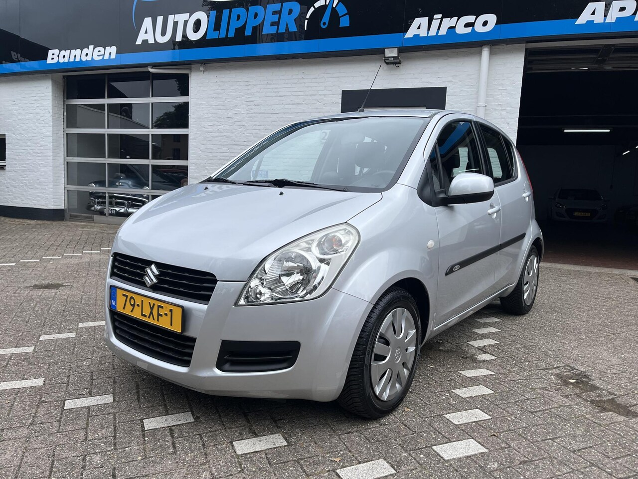 Suzuki Splash - 1.0 Comfort /Nieuwe apk bij aflevering/Thule fietsdrager/Airco - AutoWereld.nl