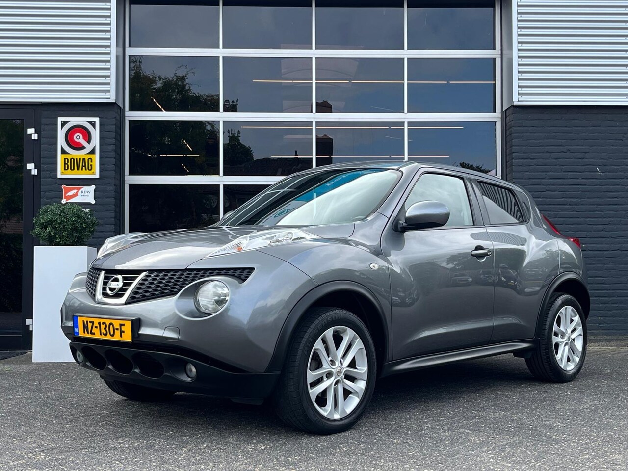 Nissan Juke - 1.6 Acenta 1.6 Acenta, Airco, Bluetooth, Camera, Cruise, Trekhaak - AutoWereld.nl