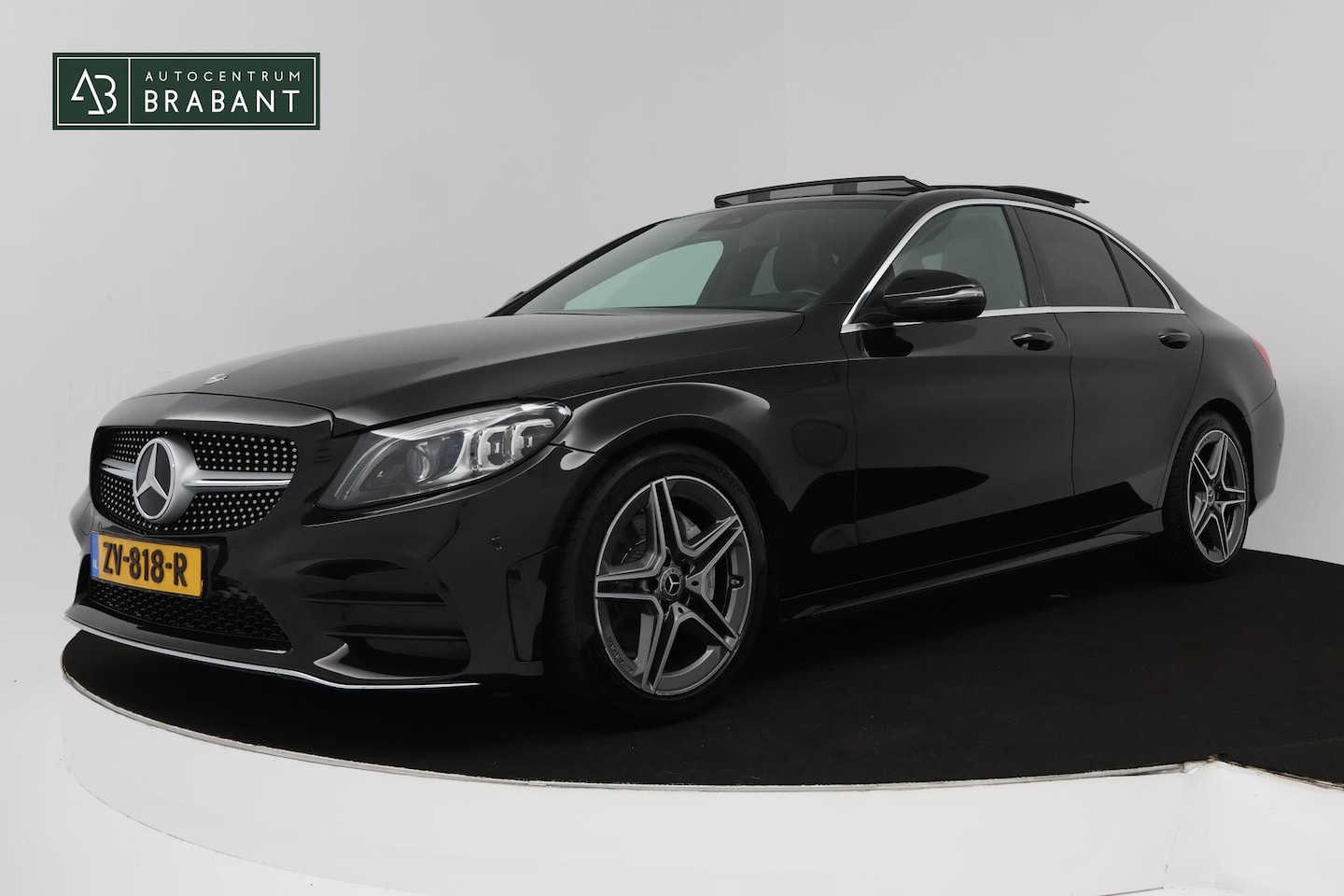 Mercedes-Benz C-klasse - 200 Business Solution AMG (PANORAMADAK, SFEERVERLICHTING, NAVIGATIE, CAMERA, STOELVERWARMI - AutoWereld.nl