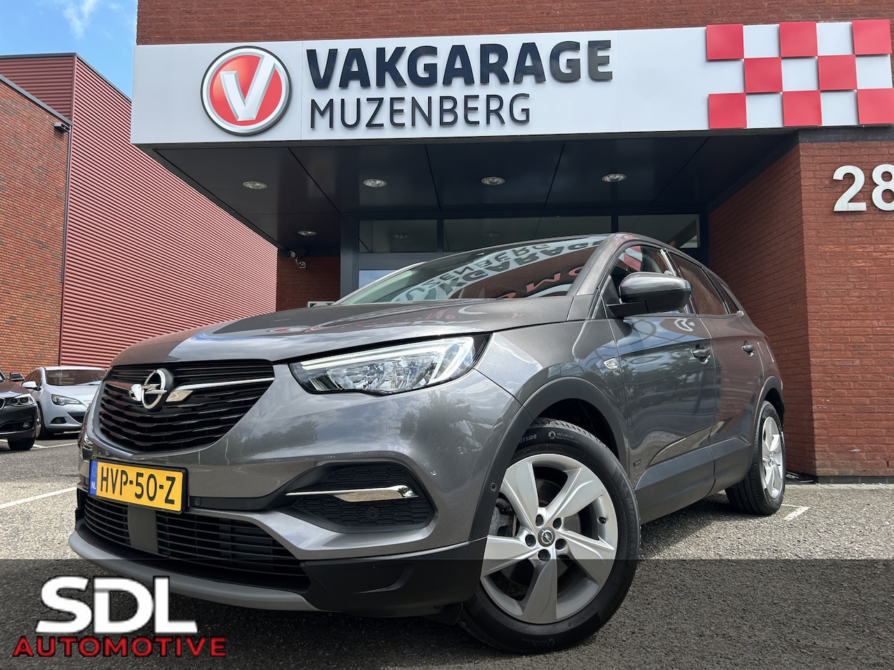 Opel Grandland - 1.6 Turbo Hybrid Business Elegance // NAVI + CARPLAY // CLIMA // PDC // CAMERA // ELEK. KO - AutoWereld.nl