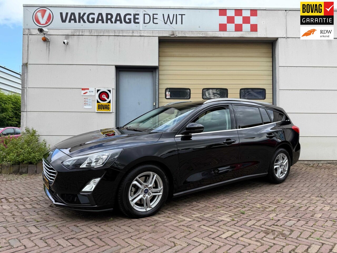 Ford Focus Wagon - 1.0 EcoBoost Titanium Business 1.0 EcoBoost Titanium Business - AutoWereld.nl