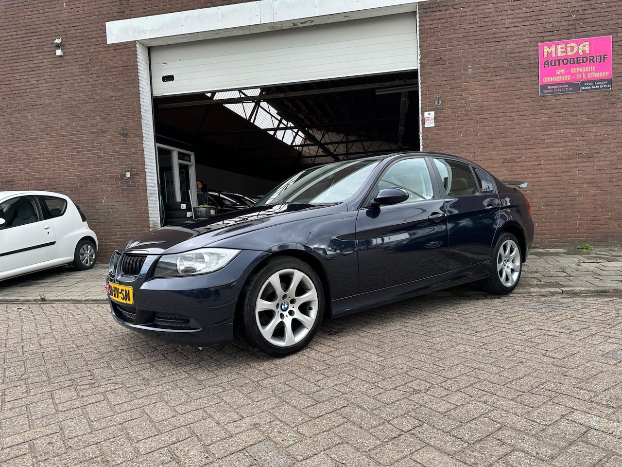 BMW 3-serie - 318i Business Line | Airco | Cruisecontrol | Uitlaatkleppensysteem - AutoWereld.nl
