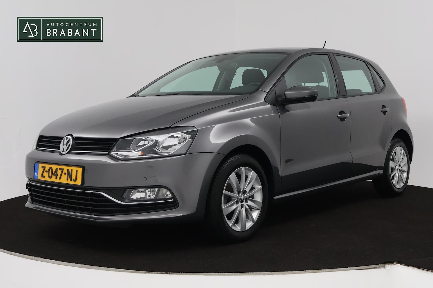 Volkswagen Polo - 1.2 TSI Comfortline (PARKEERSENSOREN, CRUISE CONTROL, BLUETOOTH, AUTOMAAT) - AutoWereld.nl