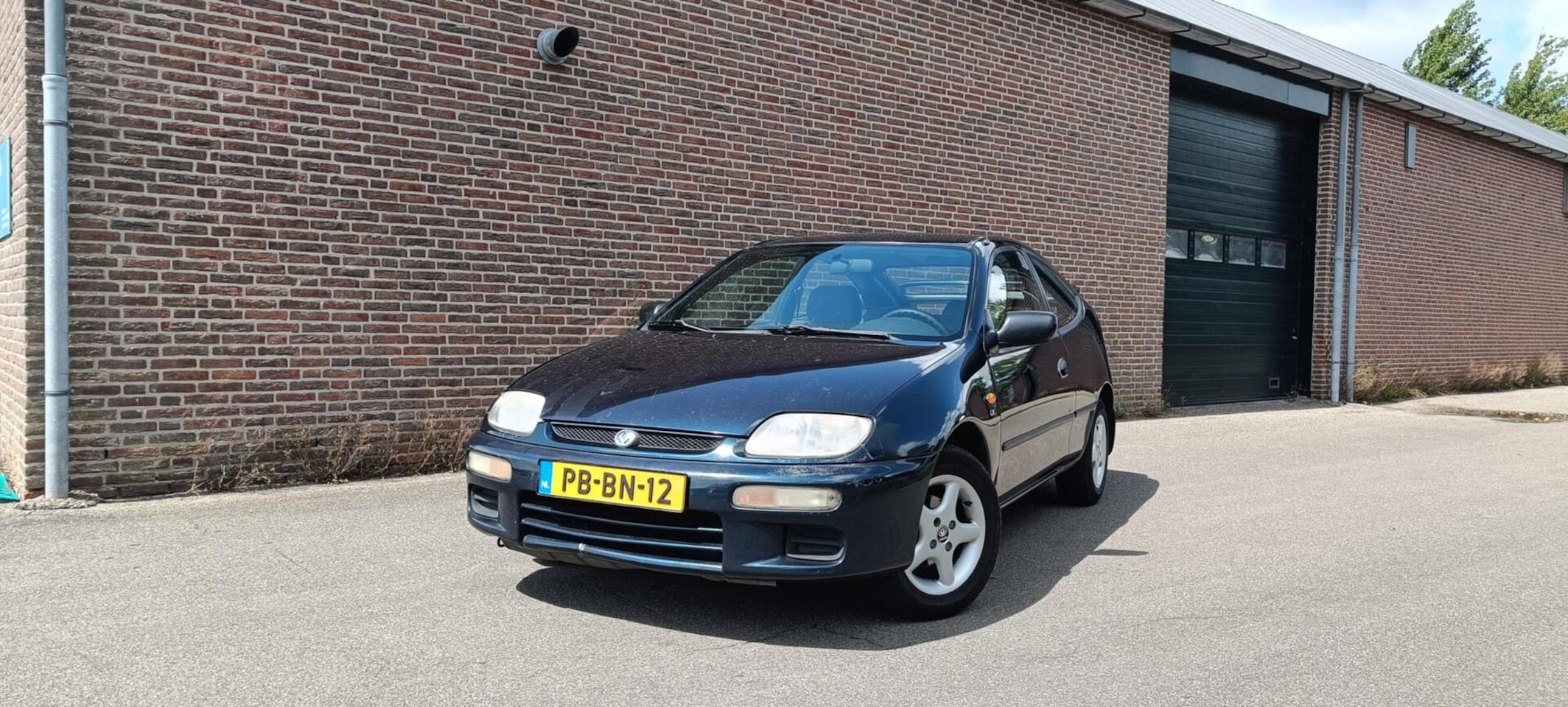 Mazda 323 - 1.3i LX 1.3i LX - AutoWereld.nl