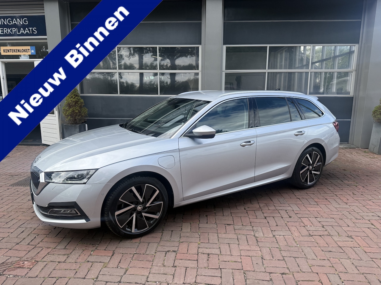 Skoda Octavia Combi - 1.4 TSI iV PHEV Sportline Business | LED | Stoelverw. | Memory | HUD | DAB | Standkachel | - AutoWereld.nl