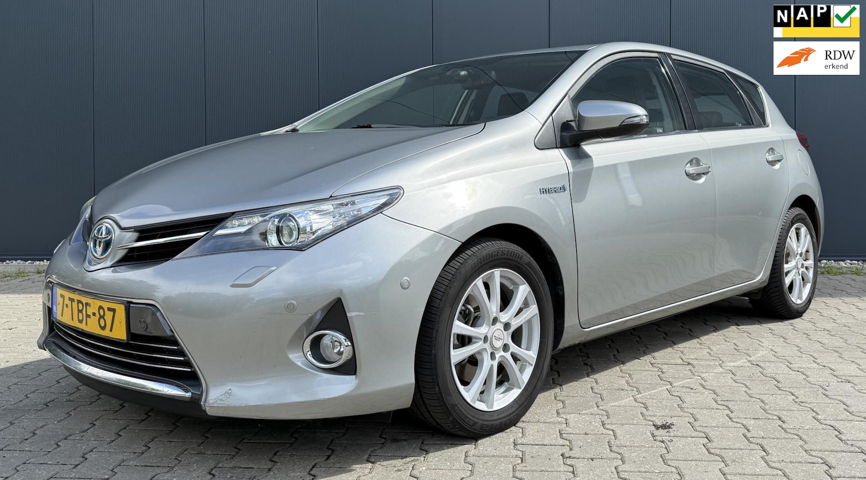 Toyota Auris - 1.8 Hybrid Lease Pro Airco cruise Navi Camera Stoelverw. - AutoWereld.nl