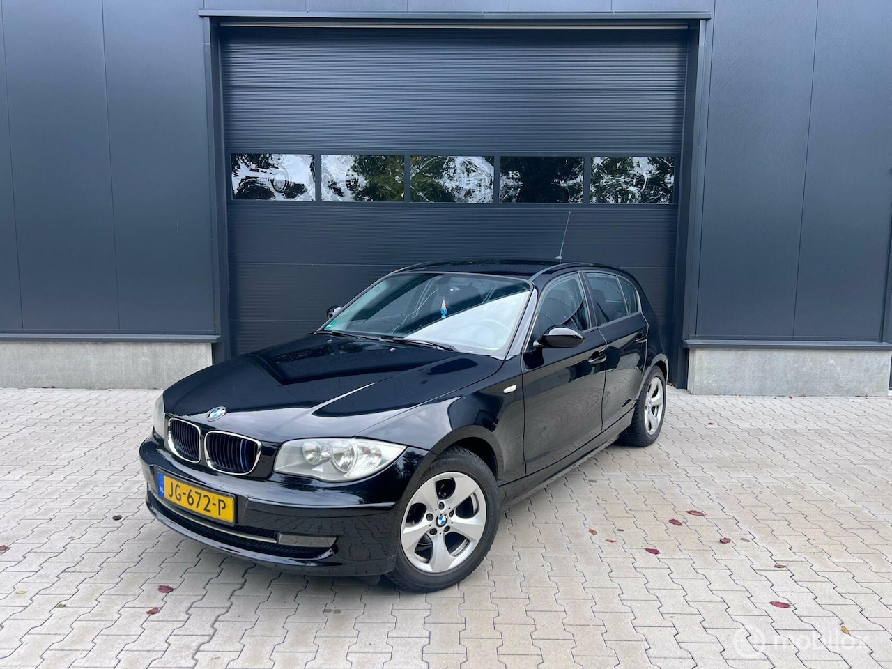 BMW 1-serie - 116i Executive 5Deurs Zwart Airco - AutoWereld.nl
