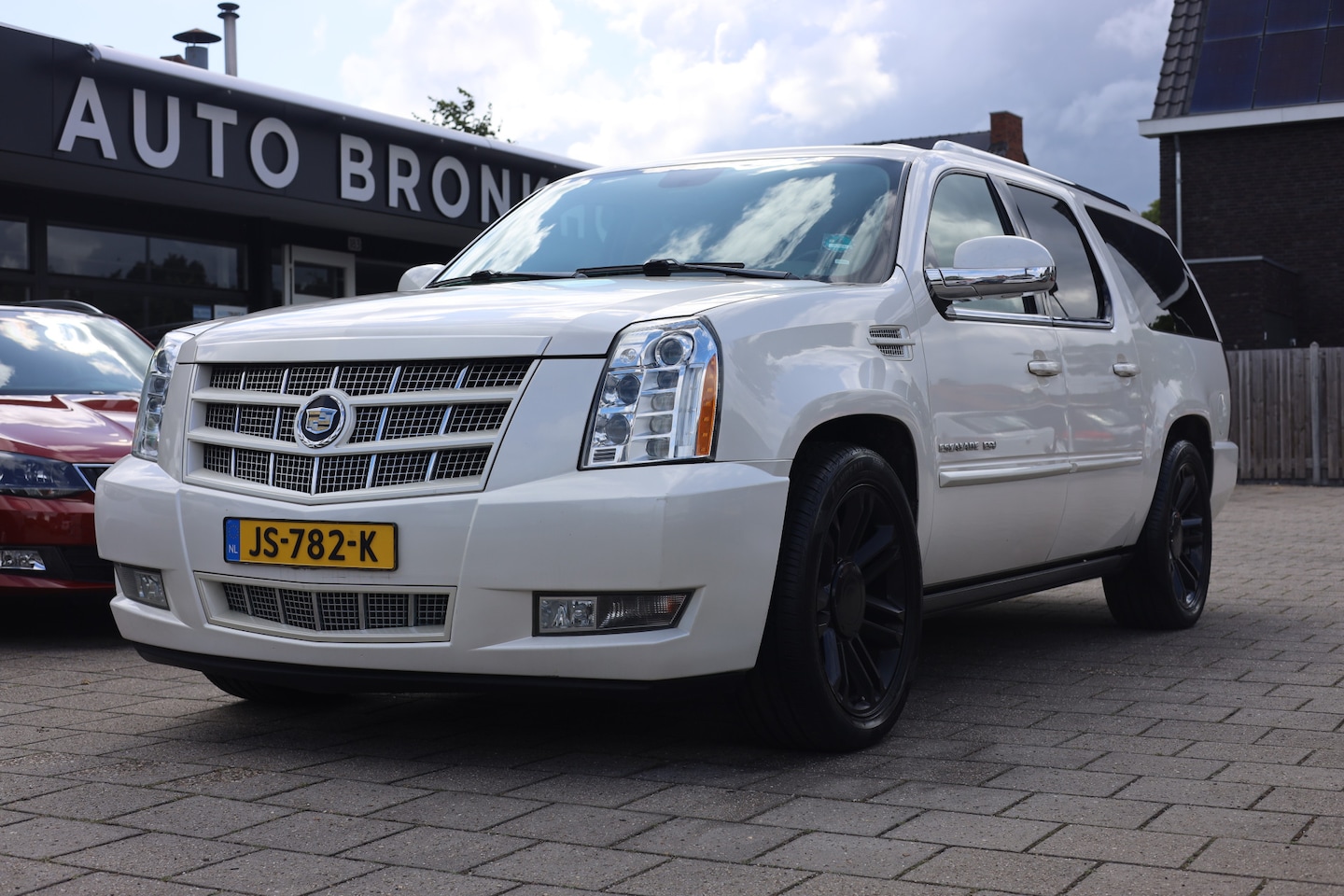 Cadillac Escalade - 6.2 V8 SPORT LUXURY I BOSE I TREKHAAK - AutoWereld.nl