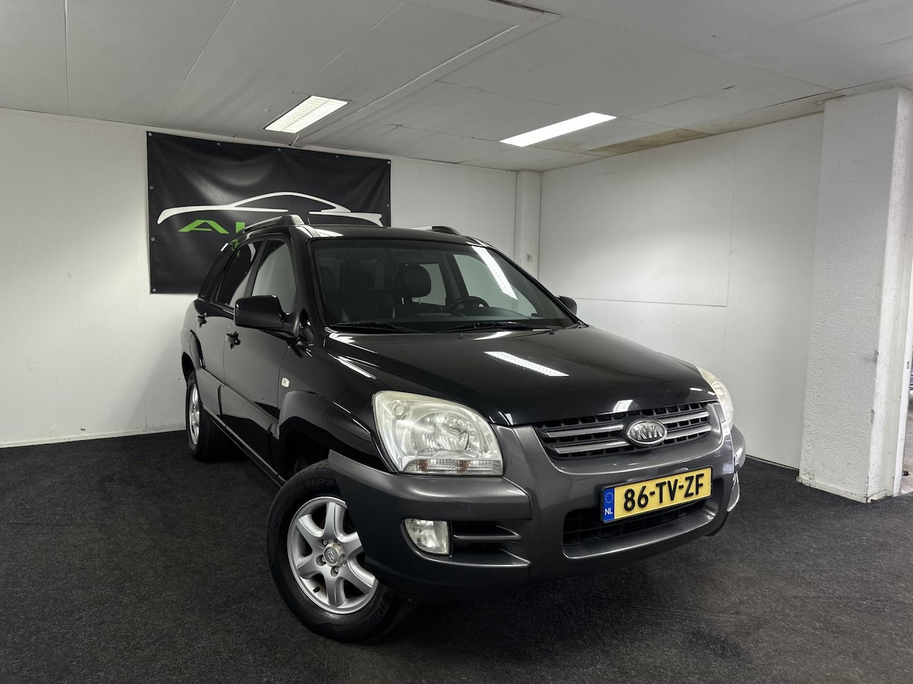 Kia Sportage - 2.0 CVVT X-ecutive - Hoge instap - PDC - Bluetooth - APK 2026 - NAP! - AutoWereld.nl