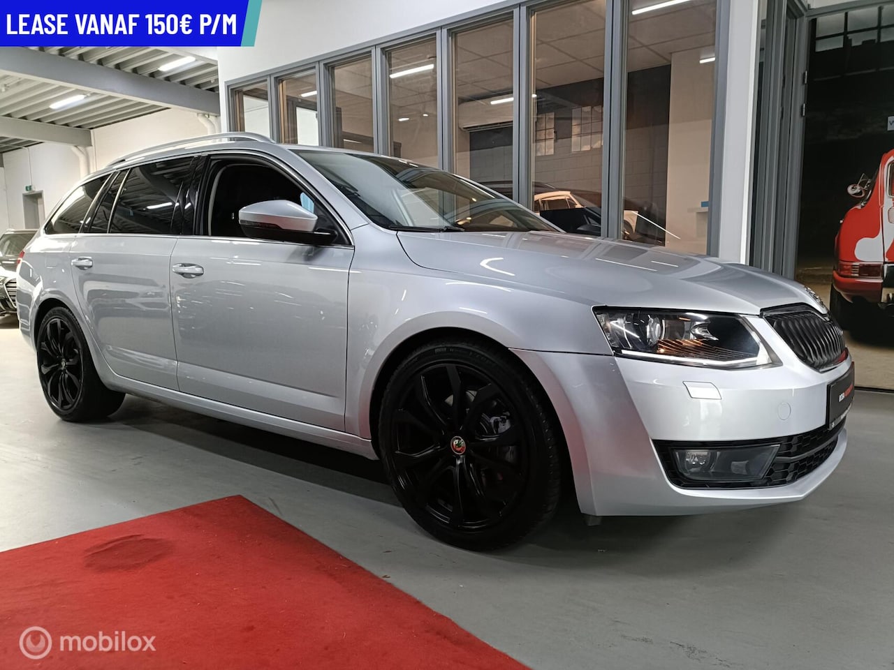 Skoda Octavia Combi - 1.8 TSI DSG RS XENON CRUISE NAVI STOELVERW PDC DCC - AutoWereld.nl
