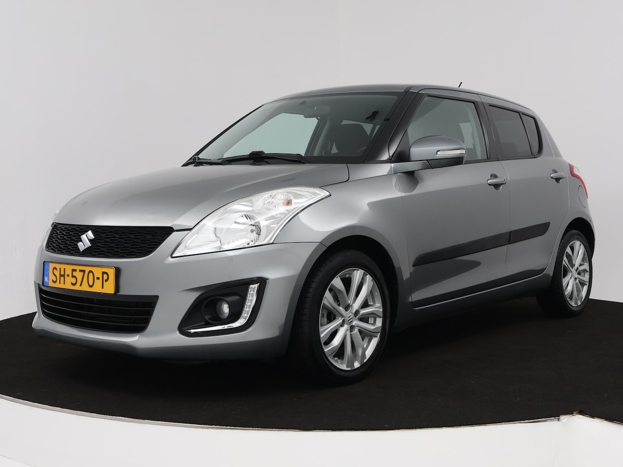 Suzuki Swift - 1.2 Exclusive | Automaat | Airco | Cruise Control | Elektrische ramen | Lm velgen | Stoelv - AutoWereld.nl