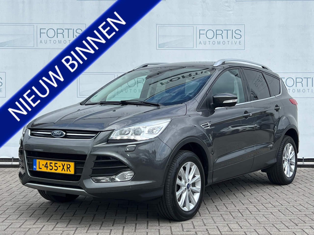 Ford Kuga - 1.5 Titanium Styling Pack TREKHAAK | PDC VOOR ACHTER | HALF LEDER | - AutoWereld.nl