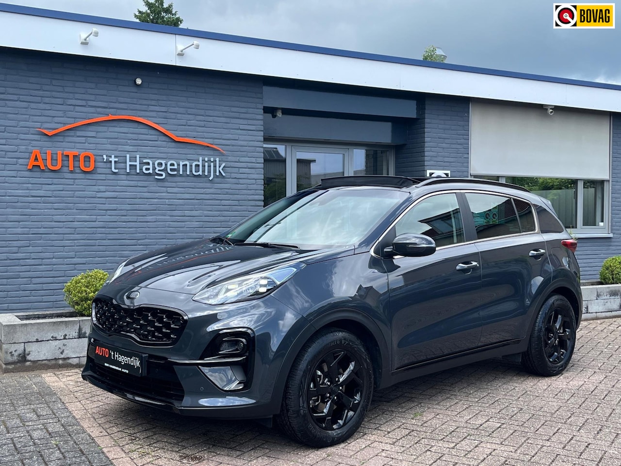Kia Sportage - 1.6 T-GDI Black Edition pano trekh 1EIG nieuwstaat - AutoWereld.nl