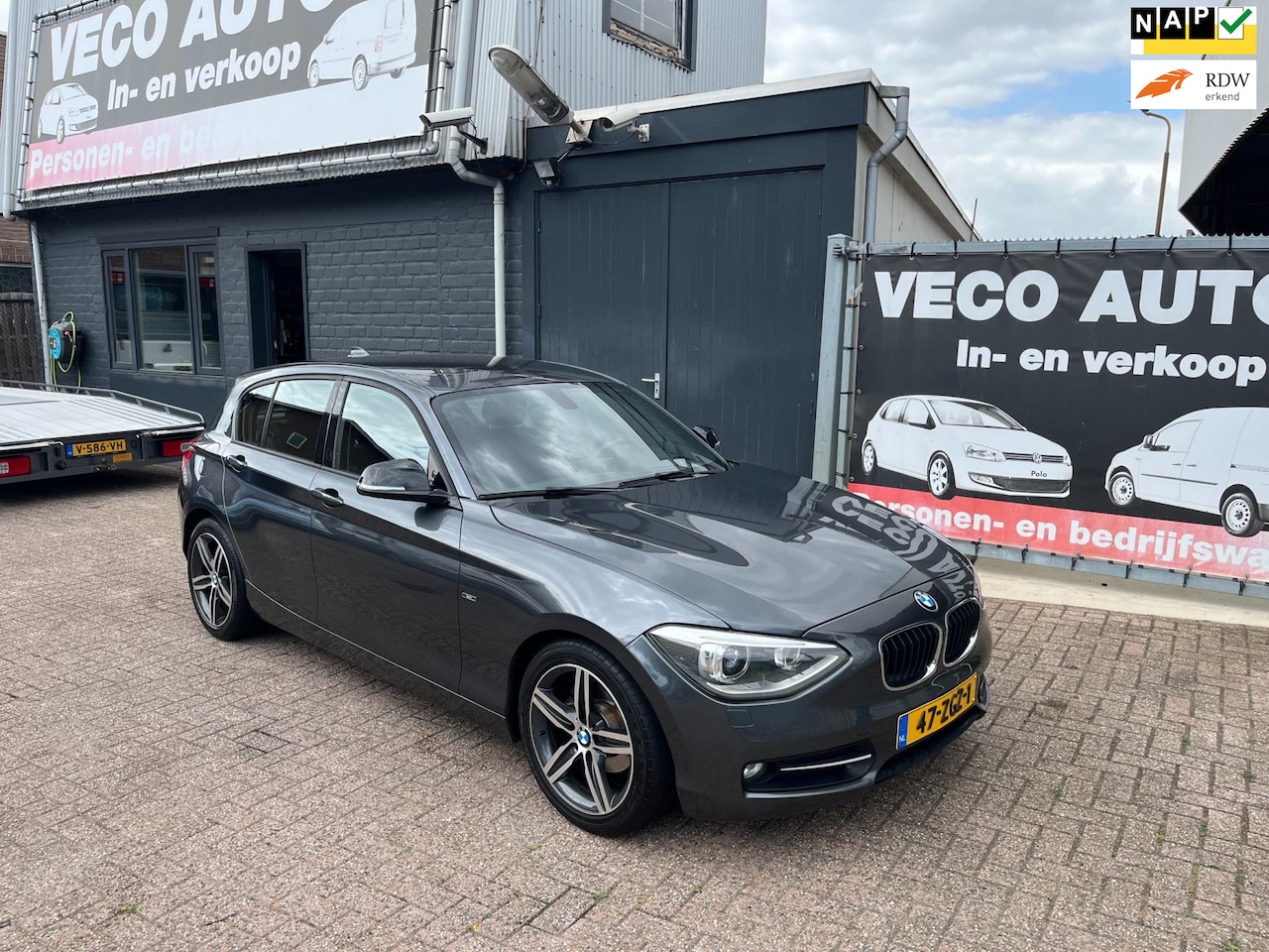 BMW 1-serie - 116i Business sport airco navi pdc xenon dealer onderhouden nette auto - AutoWereld.nl