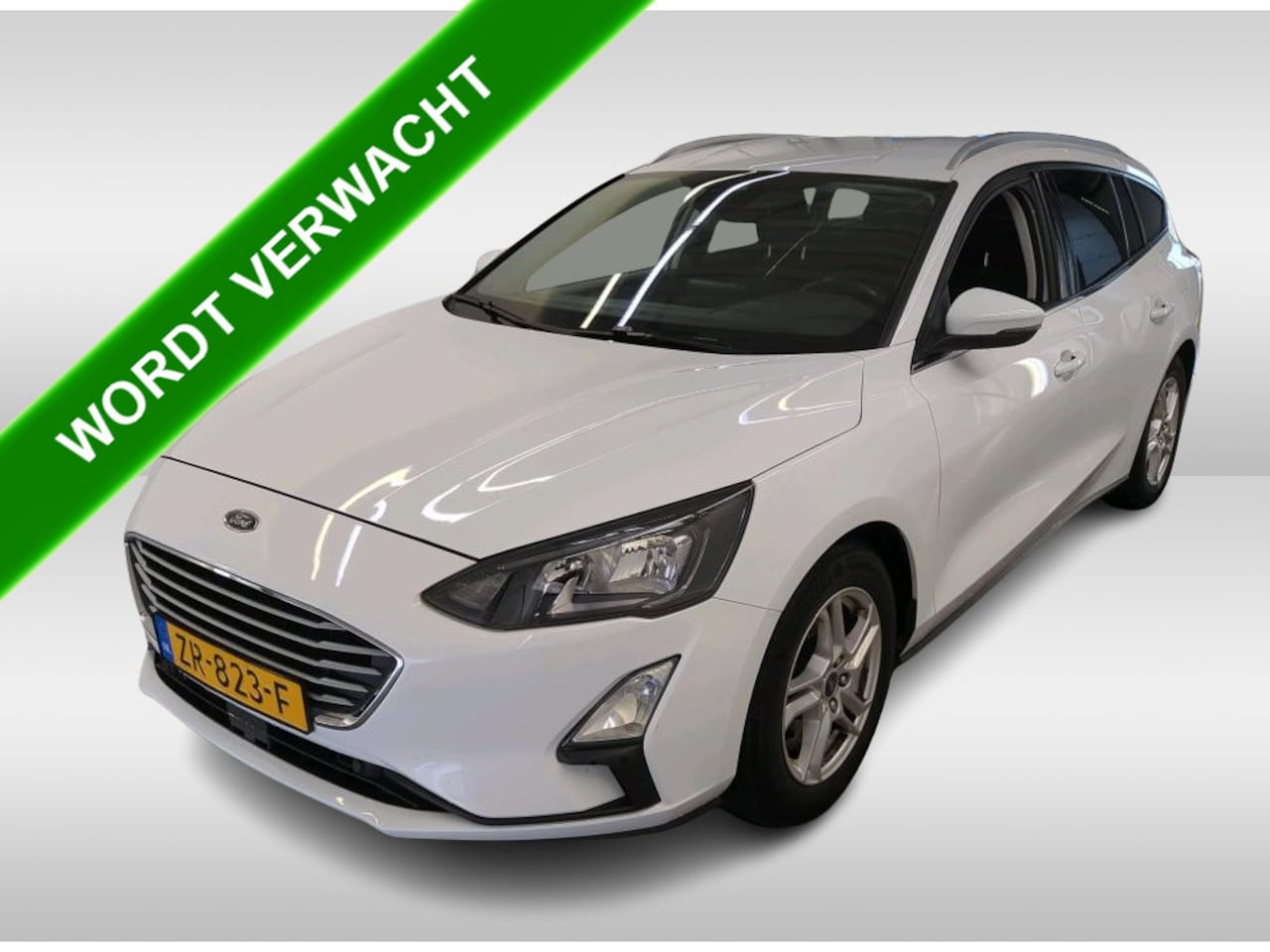 Ford Focus Wagon - 1.0 EcoBoost Edition Business / Cruise-ctr. / navi / roofrail / lm velgen / Trekhaak / - AutoWereld.nl