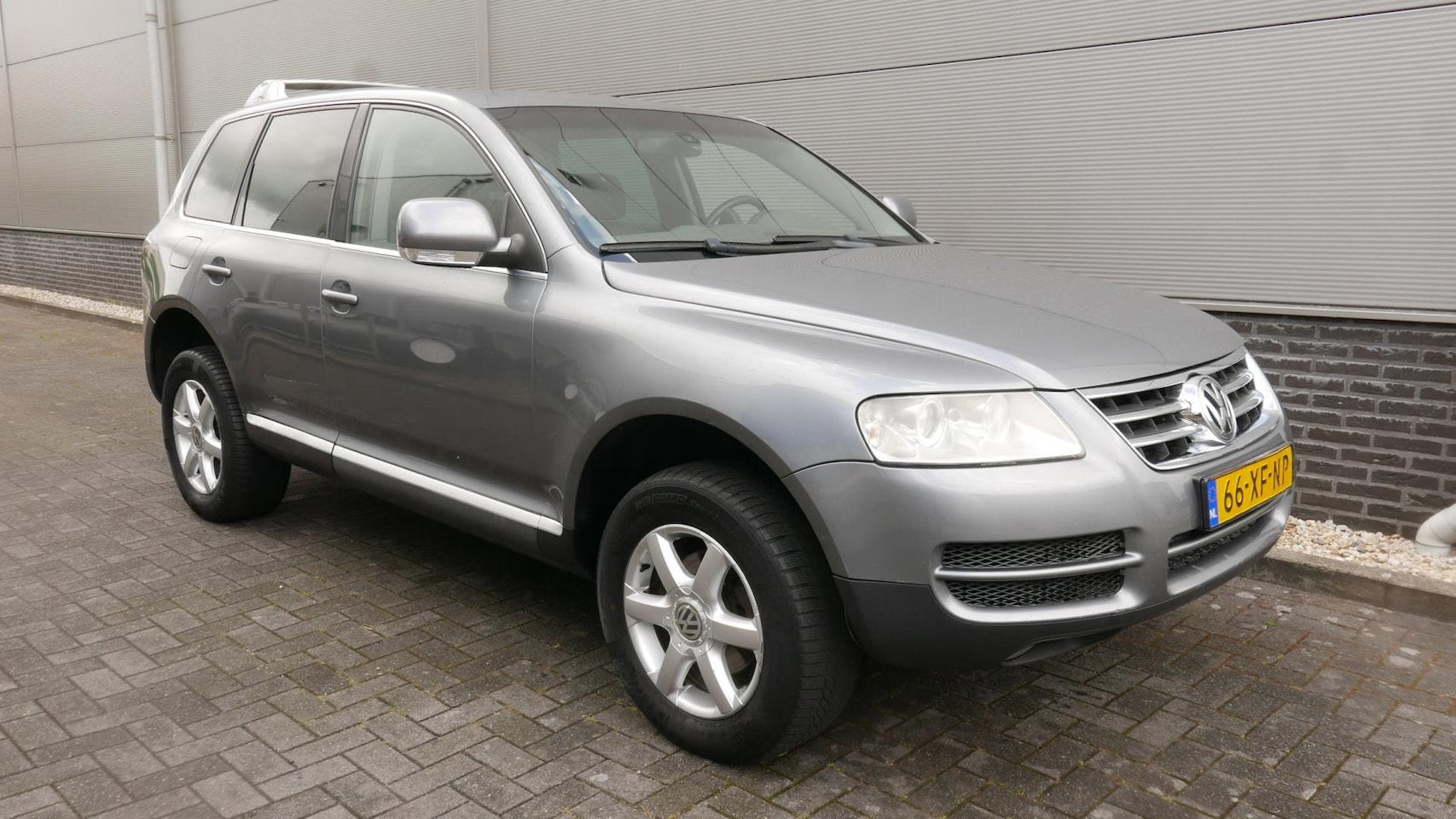 Volkswagen Touareg - 2.5 TDI 174 PK Exclusive Edition AUT,NAVI,LEER,TREKHAAK. - AutoWereld.nl