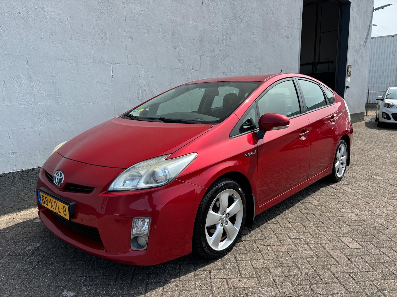 Toyota Prius - 1.8 Aspiration Hybride AUT - Trekhaak - AutoWereld.nl