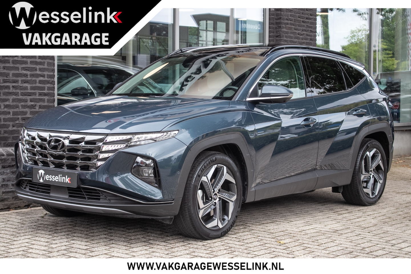 Hyundai Tucson - 1.6 T-GDI PHEV Premium Sky 4WD All-in rijklrprs | pano-schuif- k dak | Stoelvent. | - AutoWereld.nl