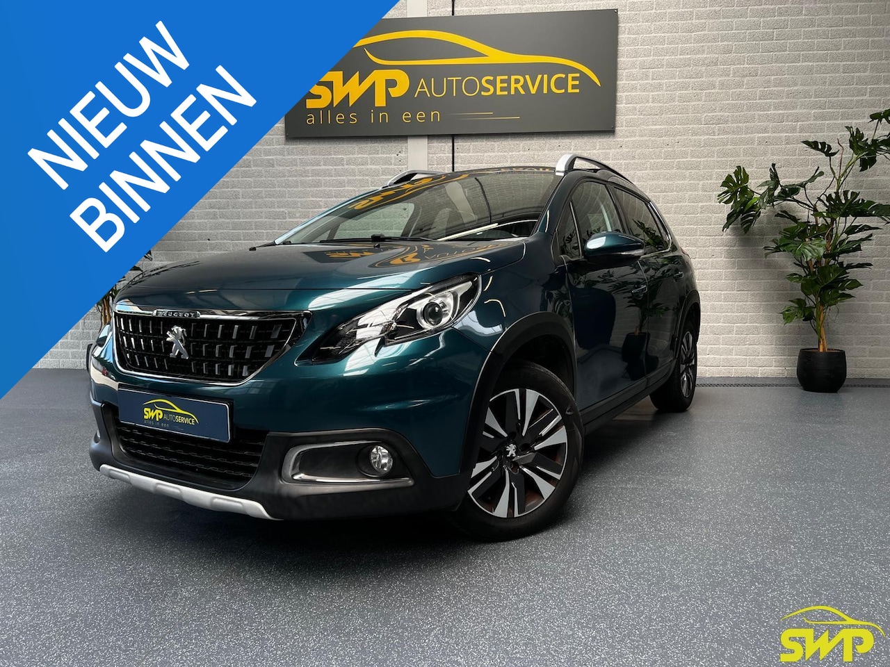 Peugeot 2008 - 1.2 PureTech Allure | Navi | Cam | Unieke kleur - AutoWereld.nl