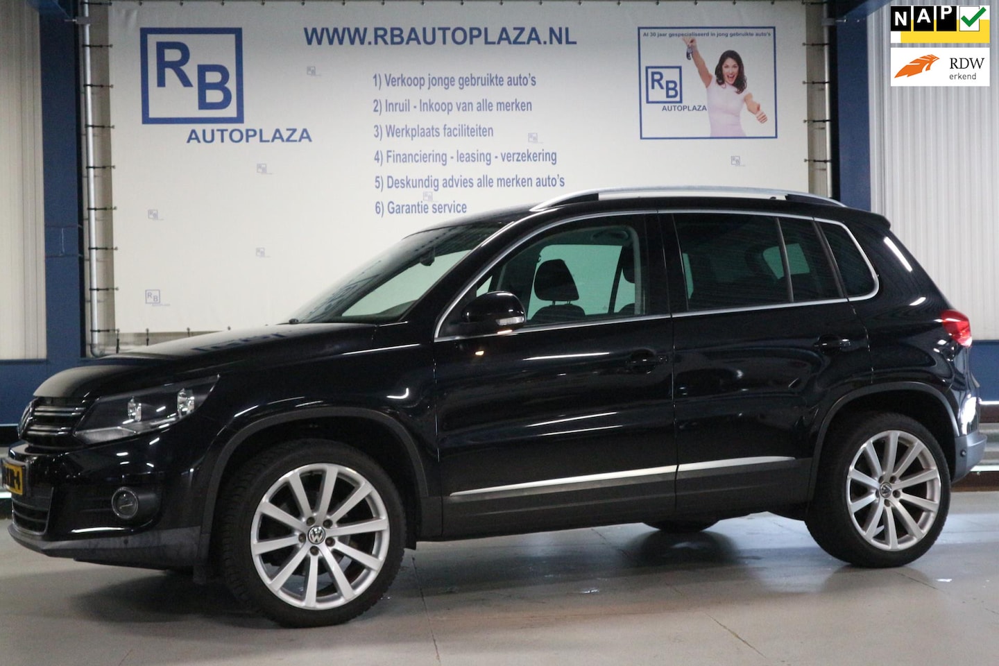Volkswagen Tiguan - 1.4 TSI Sport&Style NIEUWE KETTING/ NAP/ PARKEERSENSOREN - AutoWereld.nl