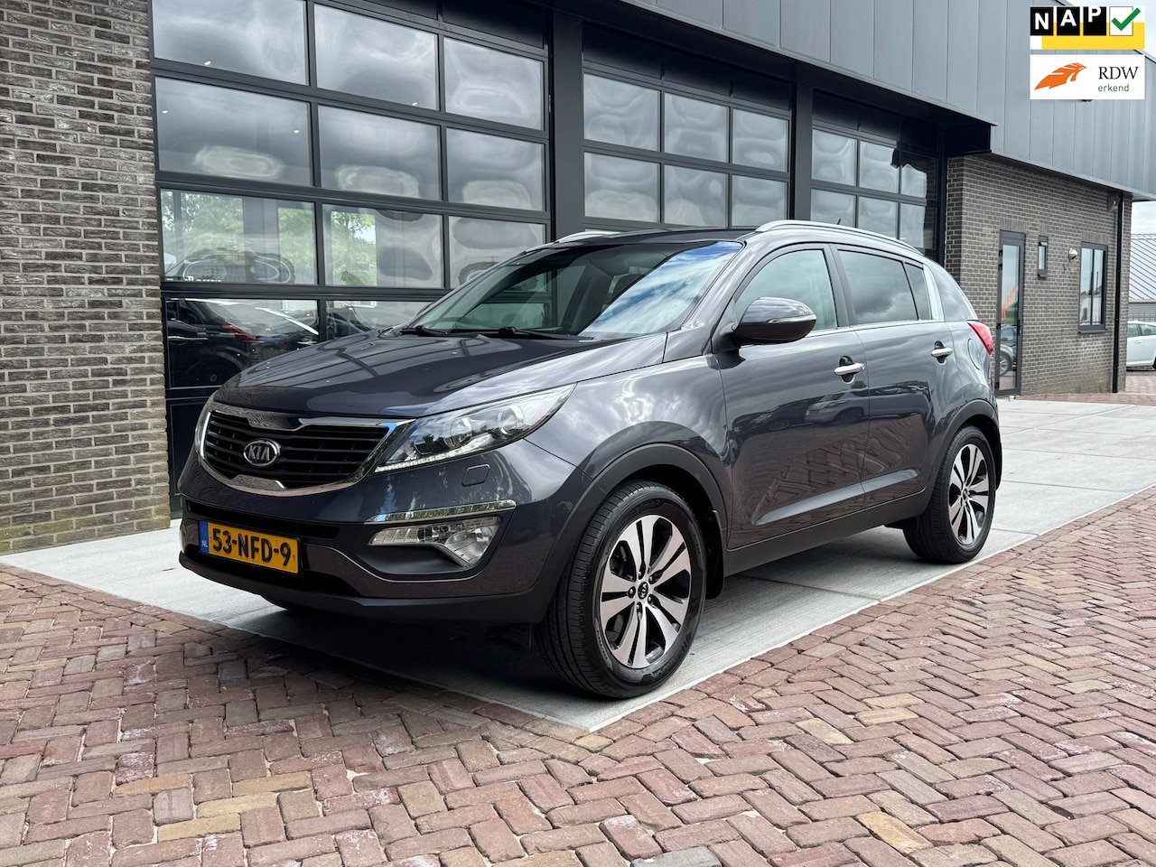 Kia Sportage - 2.0 X-clusive | Navi | Cruise | Leer | Camera | - AutoWereld.nl