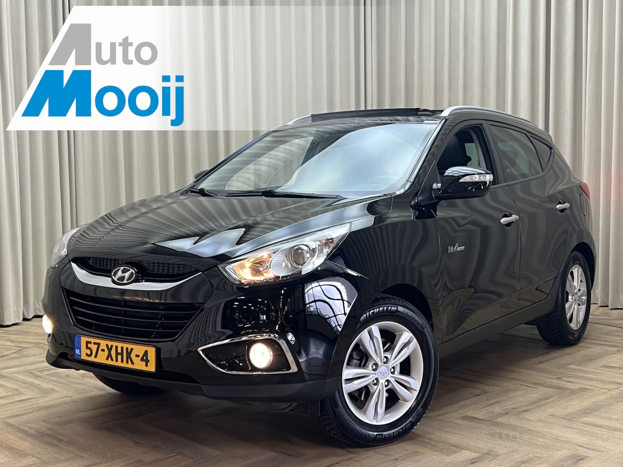 Hyundai ix35 - 1.6i GDI Style *Panodak* Trekhaak, Half-Leder, Bluetooth, Cruise, Origineel NL, Recent OH - AutoWereld.nl
