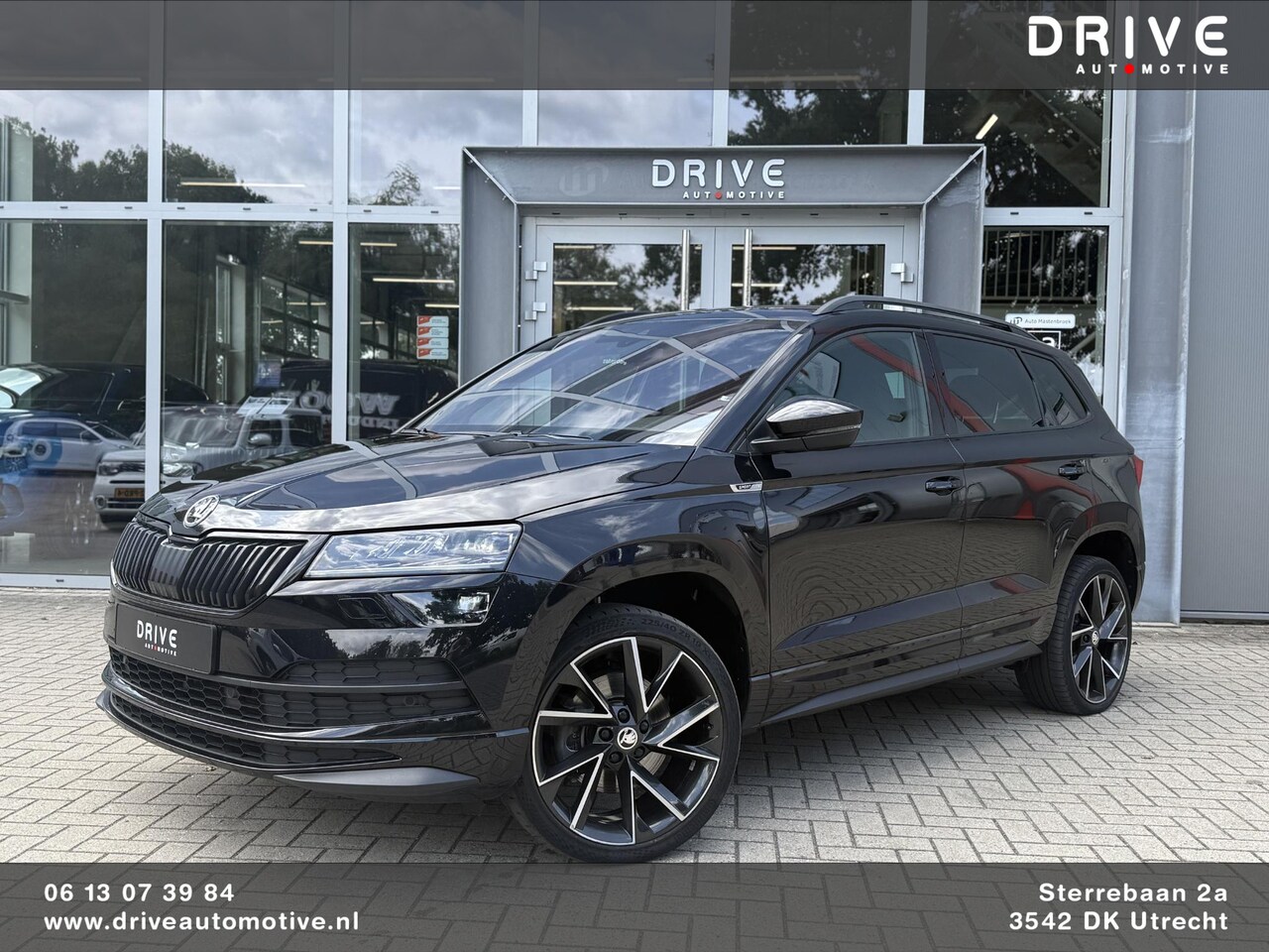 Skoda Karoq - 1.5 TSI ACT Sportline Business Ad.Cruise|Canton|19" - AutoWereld.nl