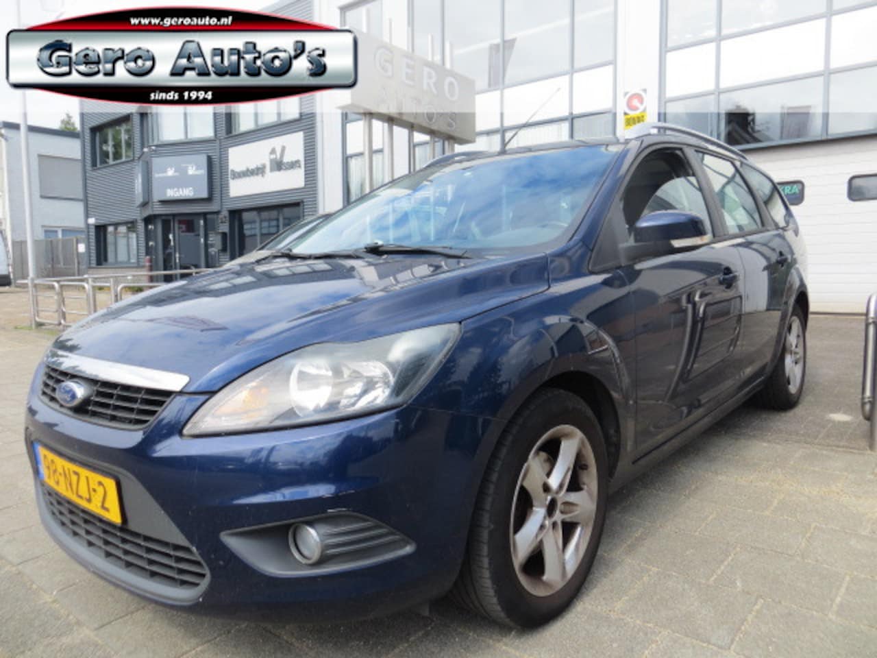 Ford Focus Wagon - 1.6 Comfort station airco ,trekhaak ,cruise control - AutoWereld.nl