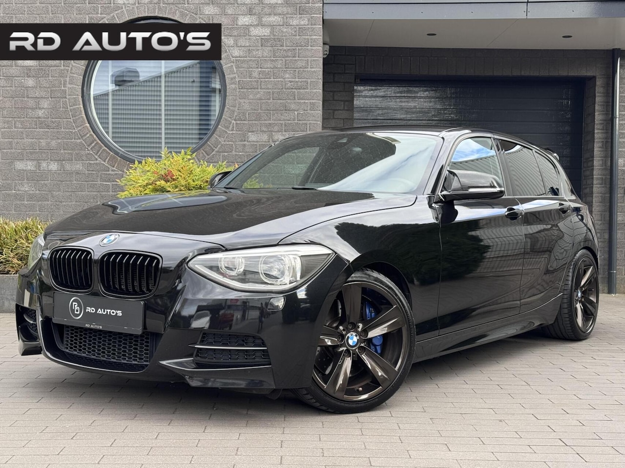 BMW 1-serie - M135i Executive Milltek KW Maxton 400PK - AutoWereld.nl