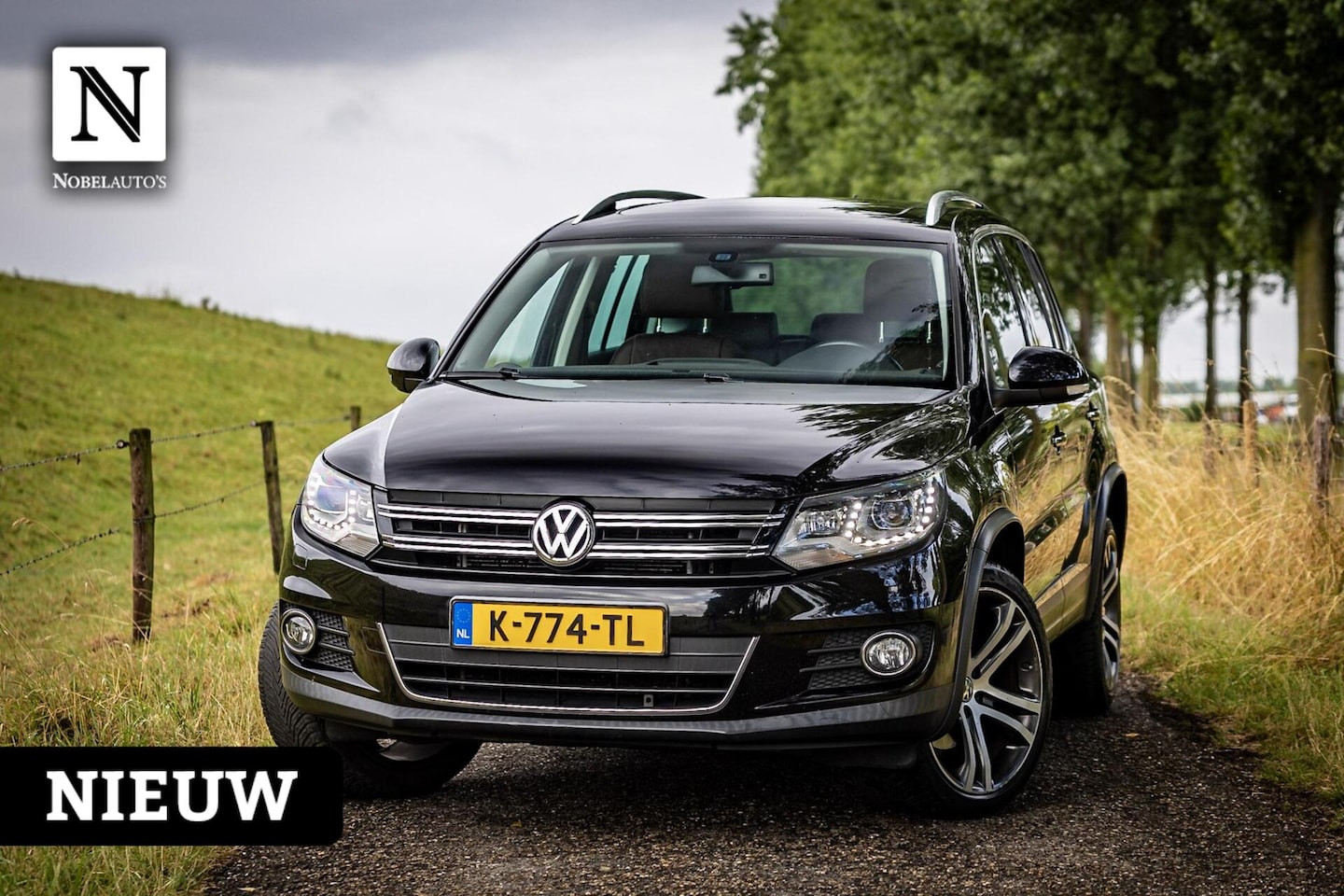 Volkswagen Tiguan - 1.4 TSI Comfort&Design|Dakje | Nwe ketting - AutoWereld.nl