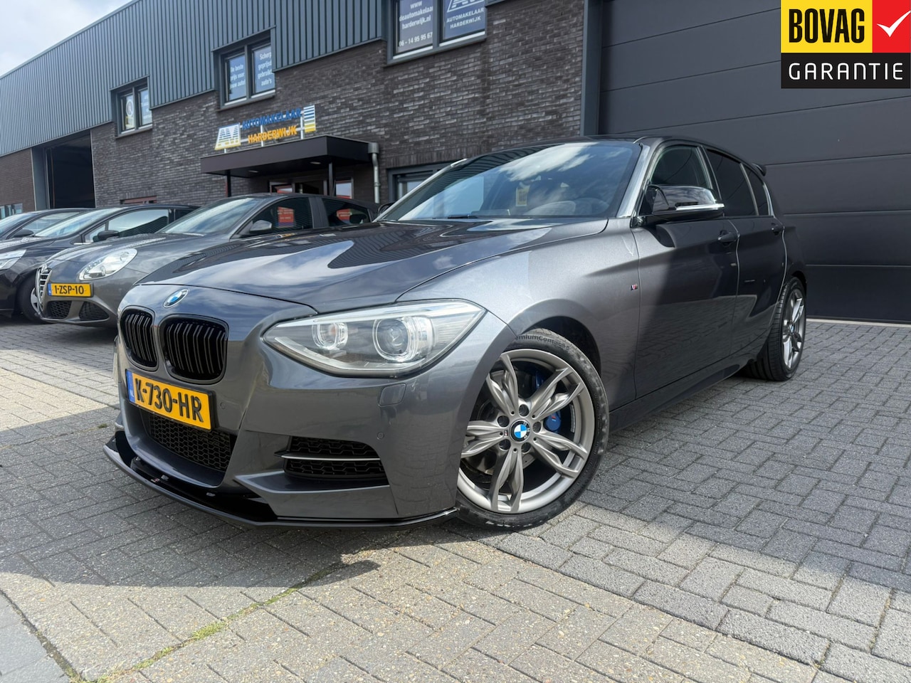 BMW 1-serie - M135i | 12 MND GARANTIE | ALCANTARA | SCHUIFDAK | NAVI | H&K | XENON | 320 PK - AutoWereld.nl
