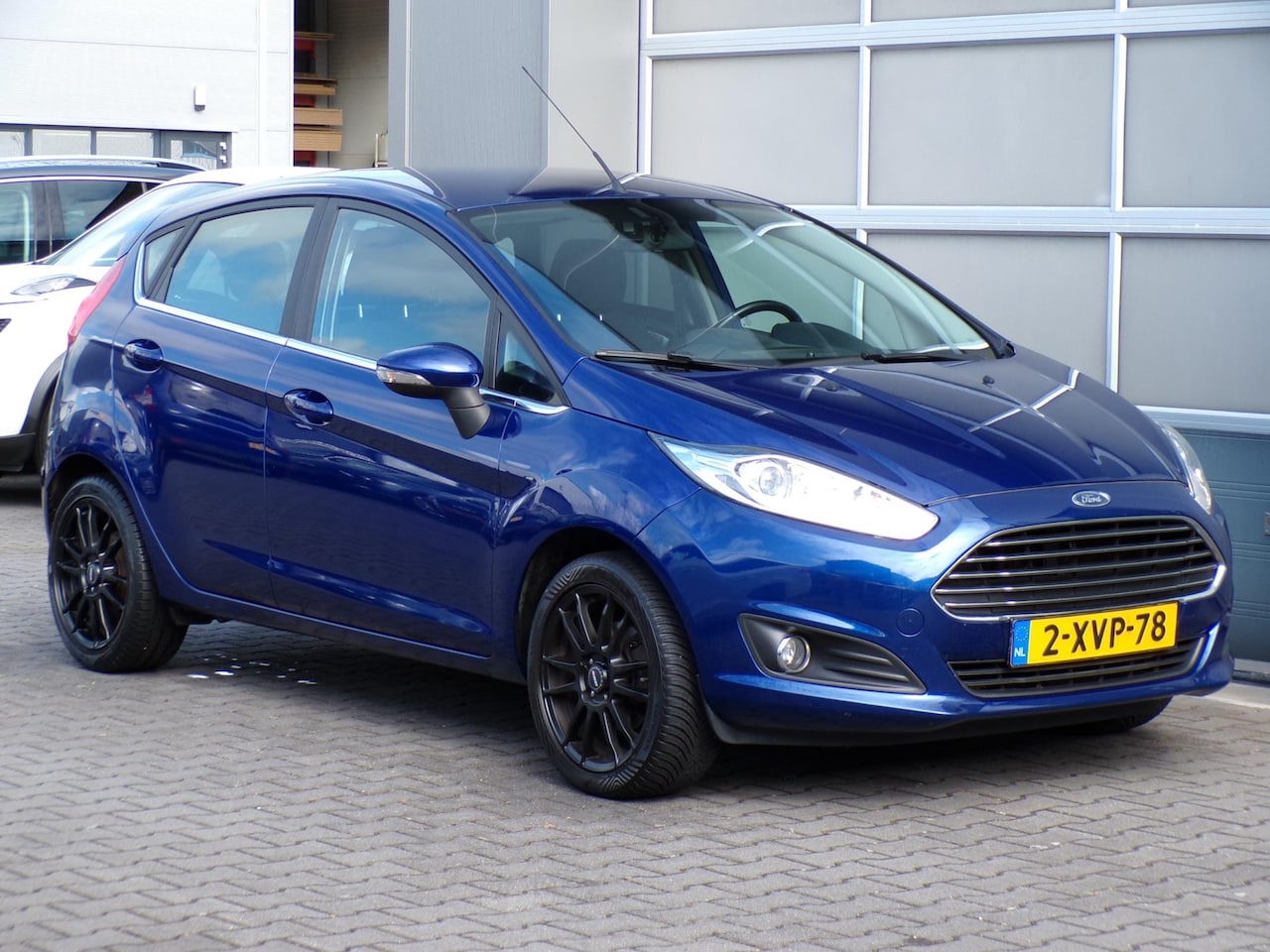 Ford Fiesta - 1.0 Titanium|Navigatie|Cruise|Aux|LED|Airco - AutoWereld.nl