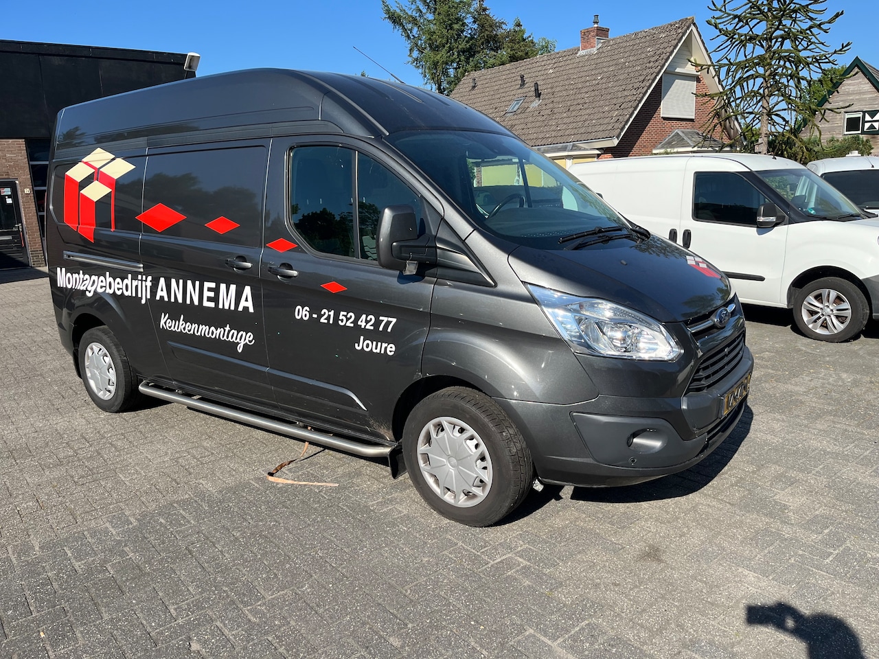 Ford Transit Custom - 290 2.0 TDCI L2H1 Limited lang hoog - AutoWereld.nl