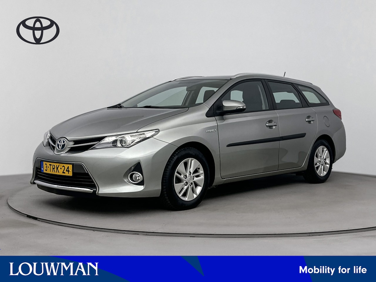 Toyota Auris Touring Sports - 1.8 Hybrid Aspiration | Cruise Control | Climate Control | Metaallak | Lichtmetalen Velgen - AutoWereld.nl