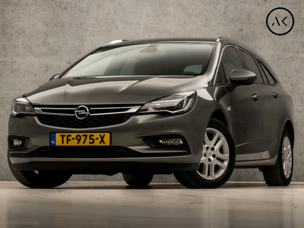 Opel Astra Sports Tourer - 1.0 Sportline (APPLE CARPLAY, NAVIGATIE, GETINT GLASSES, CHROOM PAKKET, XENON, SPORTSTOELE - AutoWereld.nl
