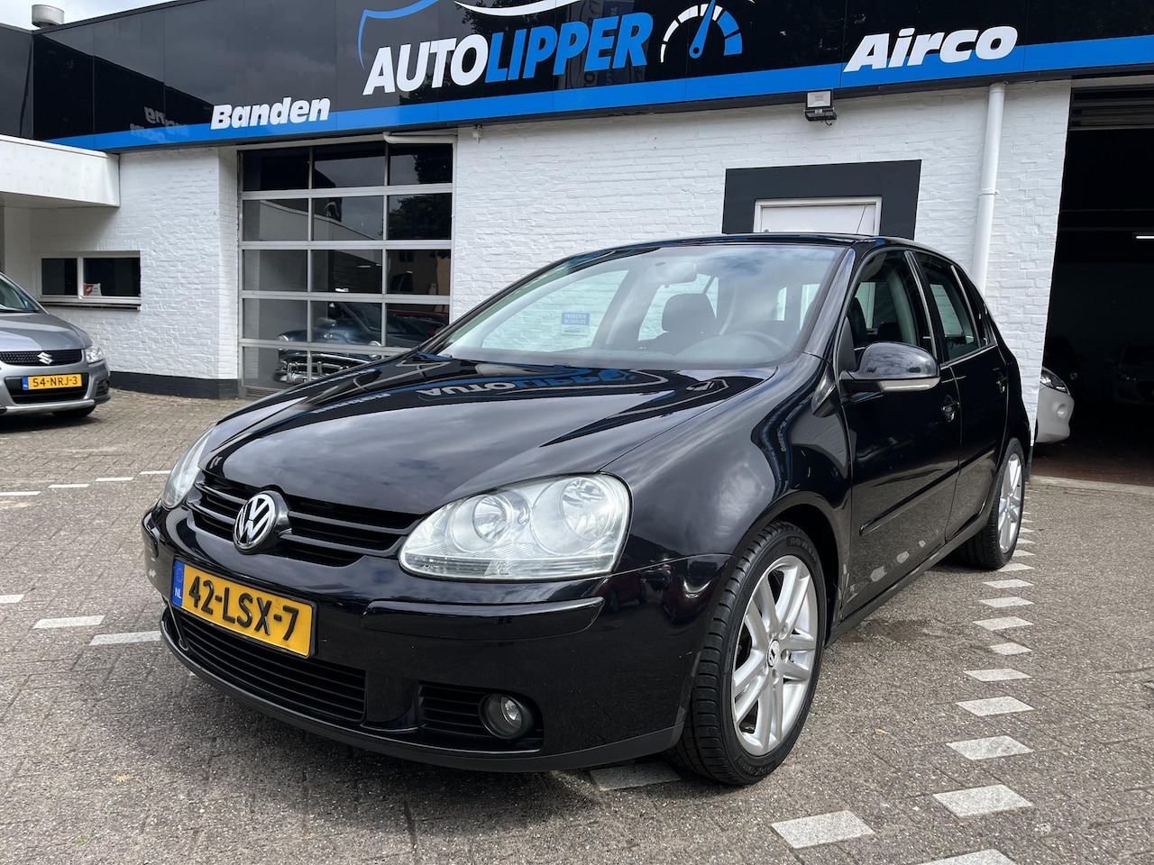 Volkswagen Golf - 1.4 Trendline /CC/2 dinn radio/Lm velgen/5 drs - AutoWereld.nl