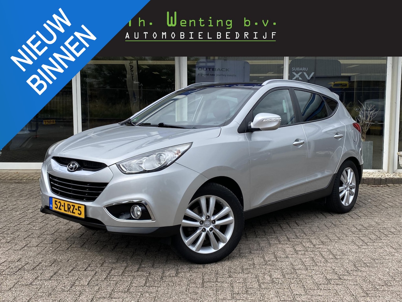 Hyundai ix35 - 2.0i i-Catcher | Stoelverwarming | Panoramadak | Lederen bekleding | Achteruitrijcamera | - AutoWereld.nl