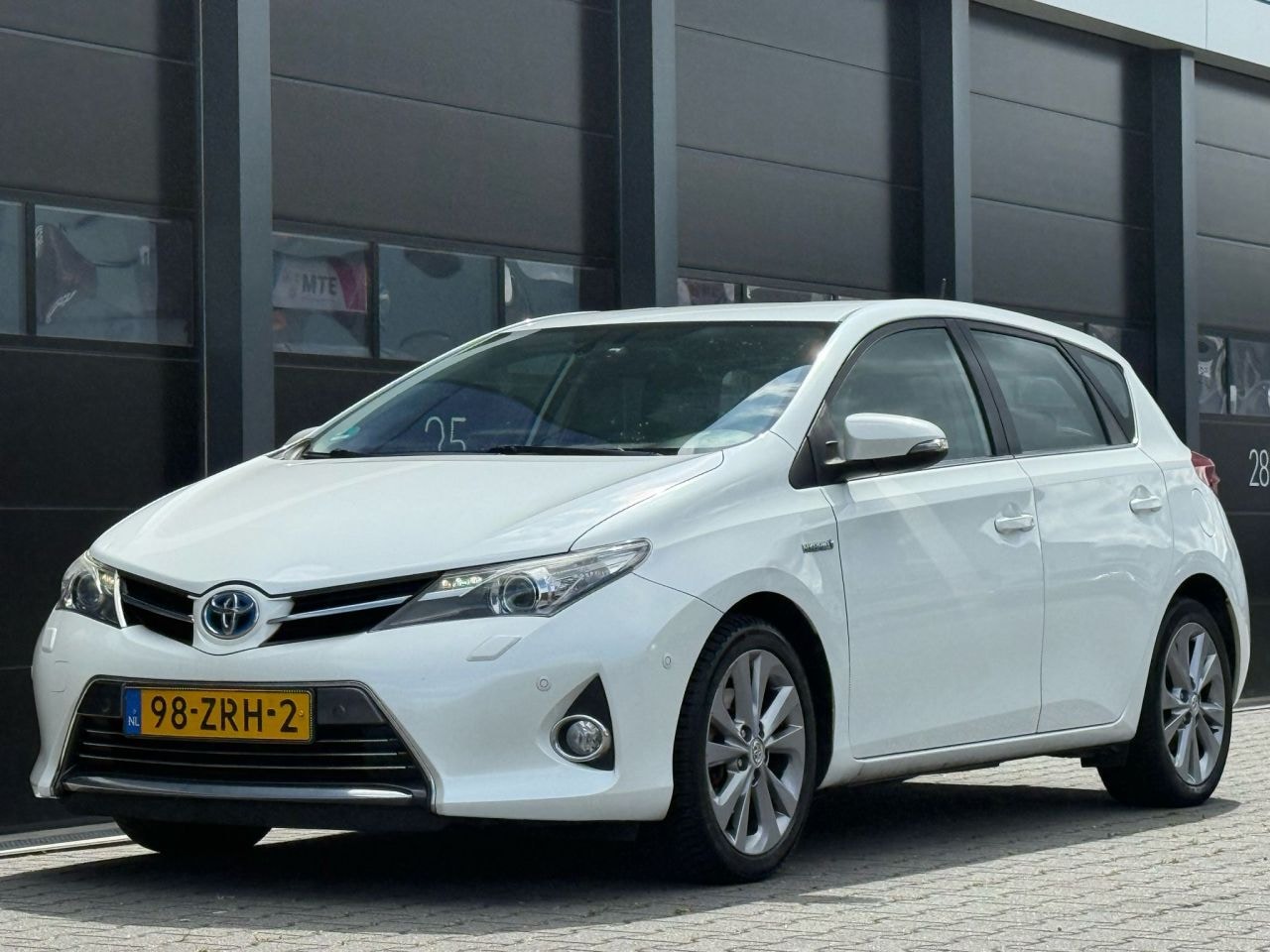 Toyota Auris - 1.8 Hybrid Navi Clima - AutoWereld.nl